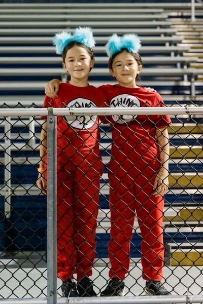 Students outside in Halloween costumes.