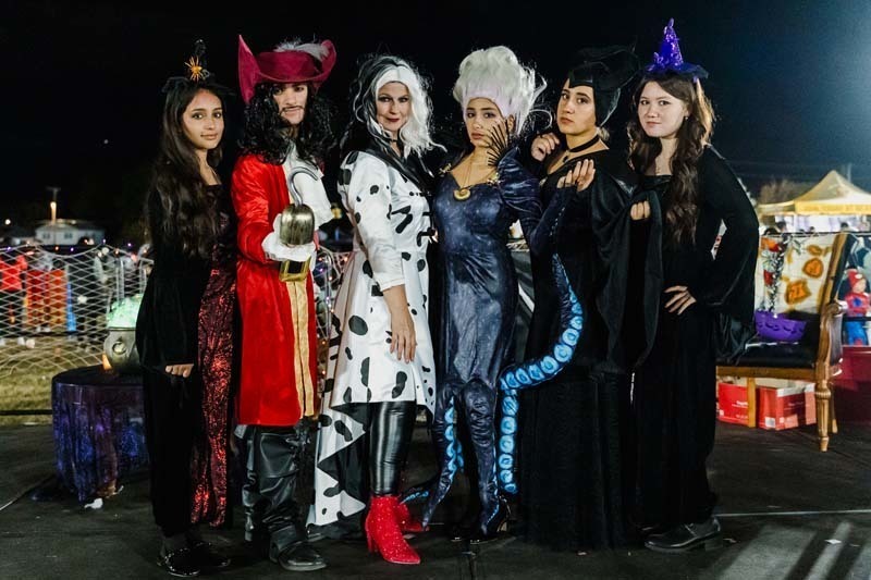 Students outside in Halloween costumes.