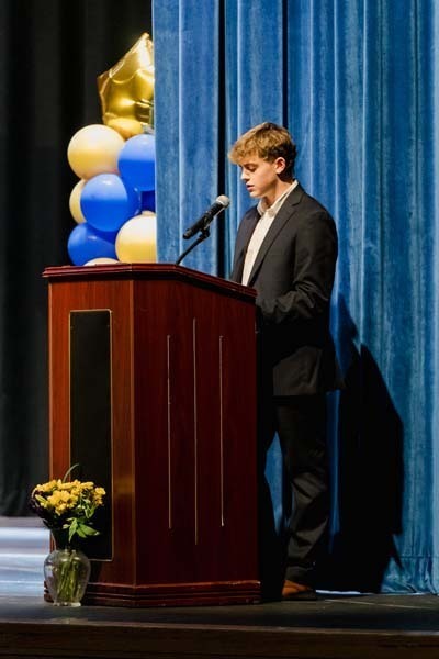 Student accepting award.