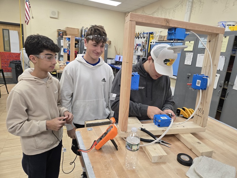 Student in Bethpage High School's Home Improvement Class master electrical circuits!