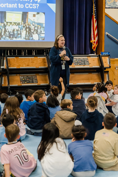 students watch presentation