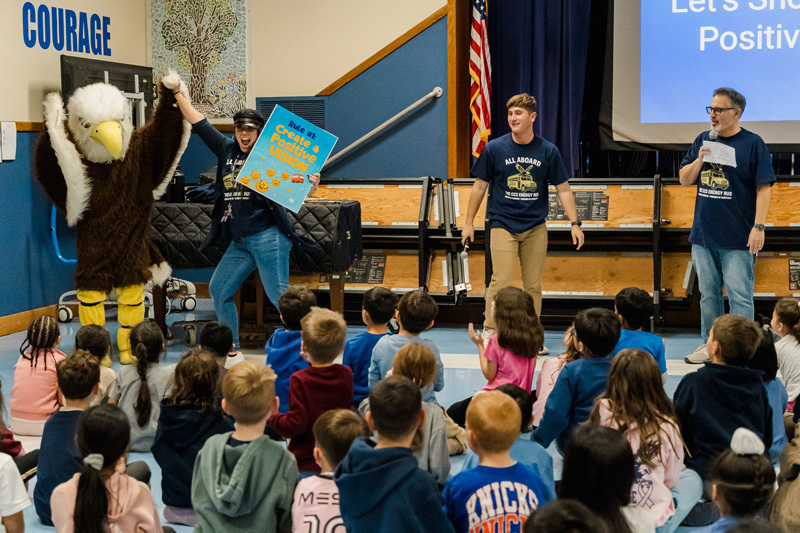students watch presentation