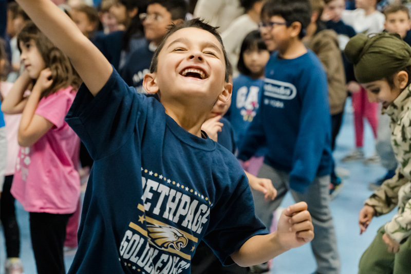 students watch presentation