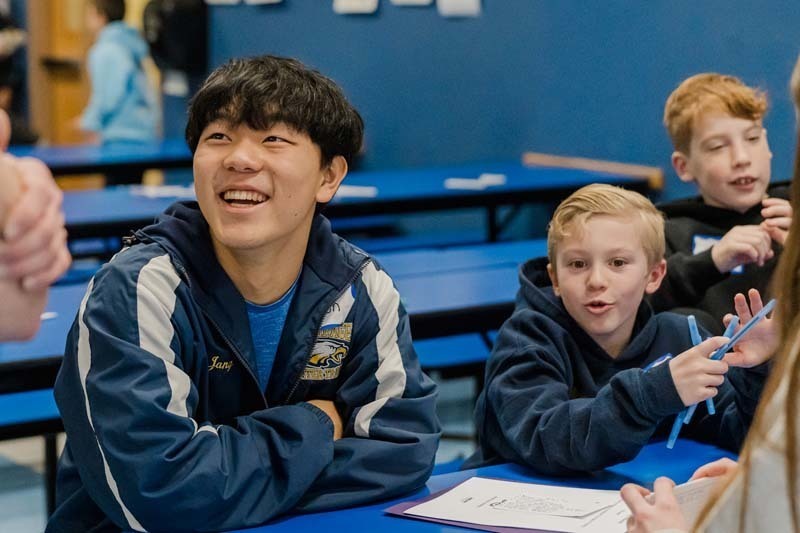 Bethpage High School athletes returned to their elementary school roots on Dec. 5, bringing mentorship and inspiration to fifth graders at Charles Campagne School through the Athletes Helping Athletes program.