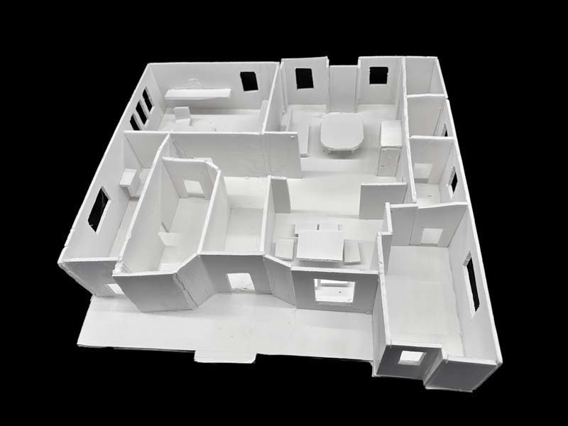 A white foam core scale model from a high school architecture class