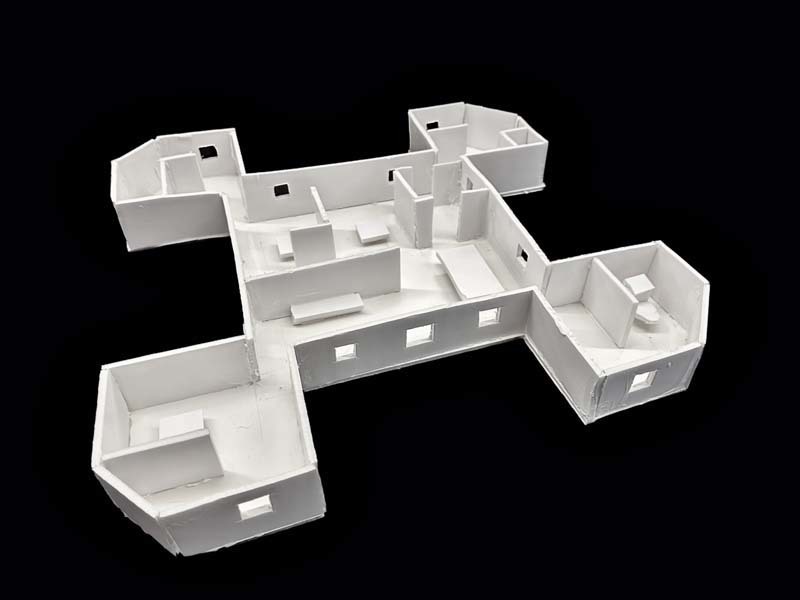 A white foam core scale model from a high school architecture class