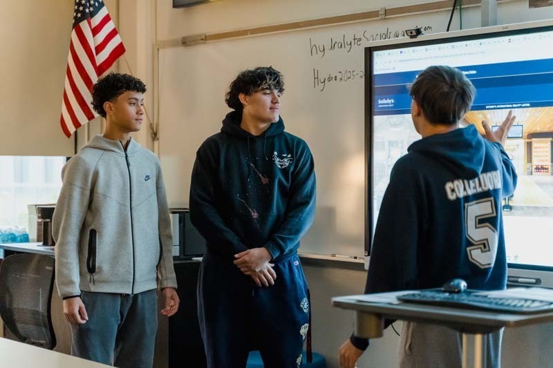 Students discussing what they have learned.