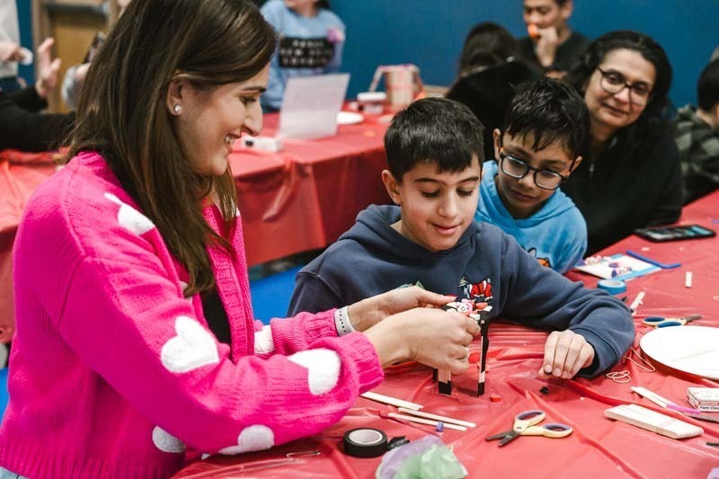 Fourth graders at CCS welcomed special guests of their choosing for a Valentine's Day celebration that blended learning with fun.