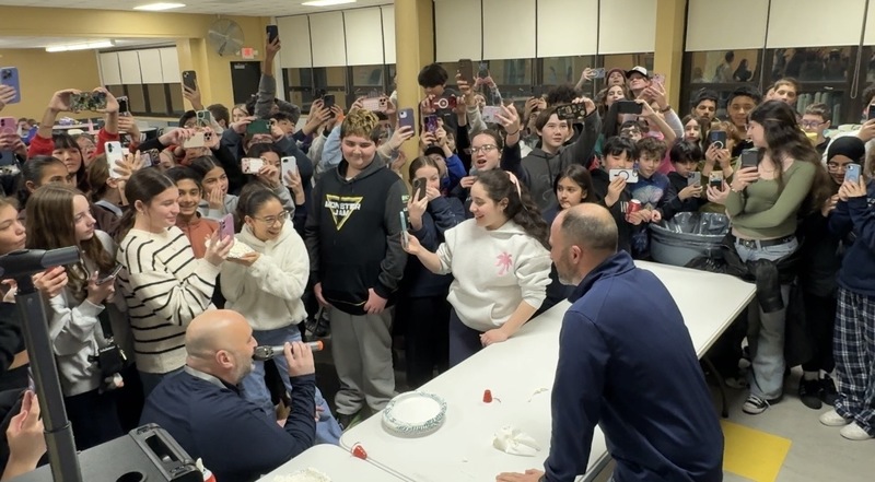 Mr. Regan and 6th grader Vanessa Bonilla