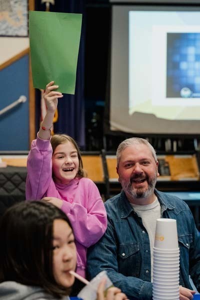 Student and parent working on project.