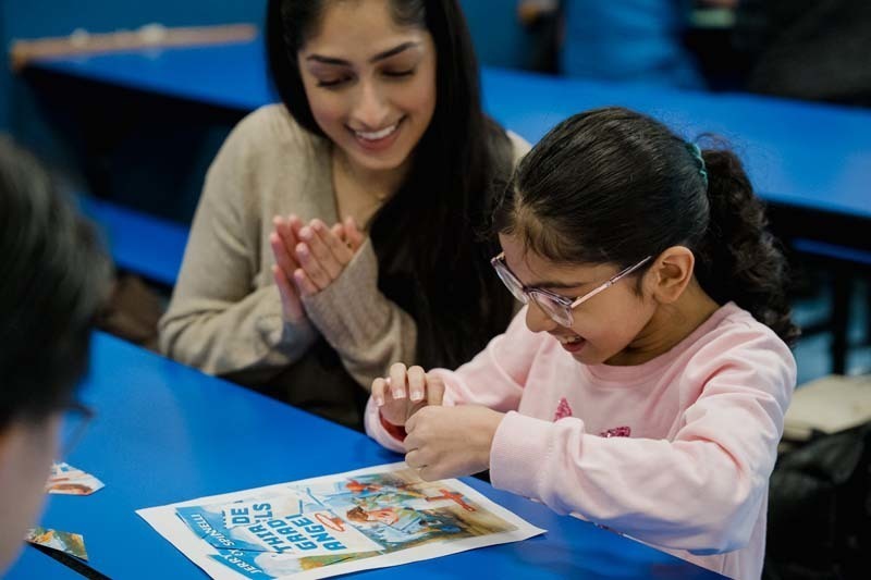 Student and parent working on project.