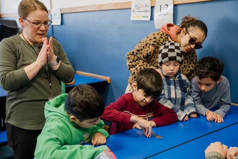 Student and parent working on project.