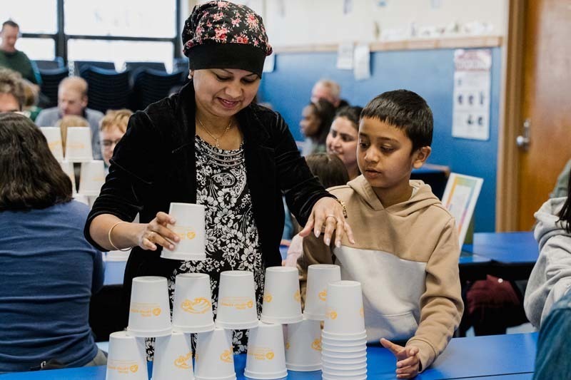 Student and parent working on project.