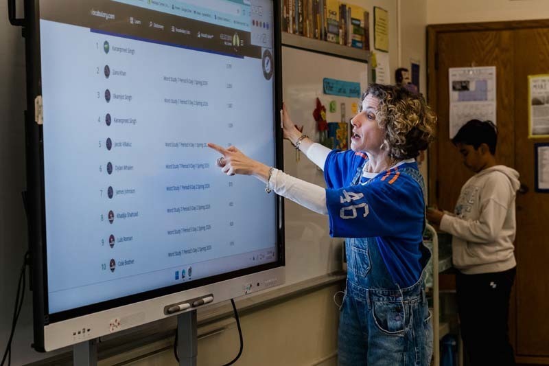 Student working on laptop.