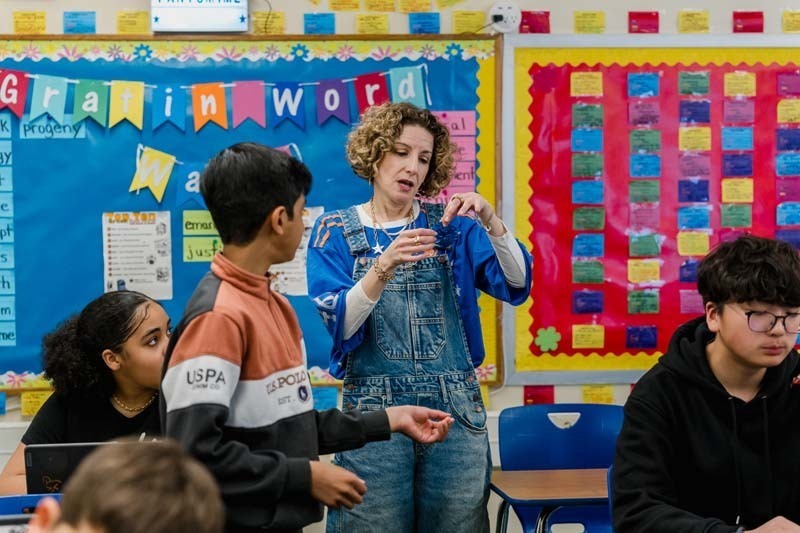 Student working on laptop.
