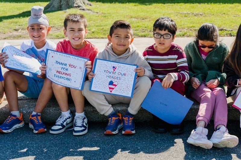 Charles Campagne Elementary School marked the first day of May with an enthusiastic tribute to local first responders