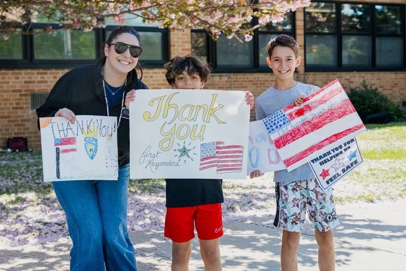 Charles Campagne Elementary School marked the first day of May with an enthusiastic tribute to local first responders