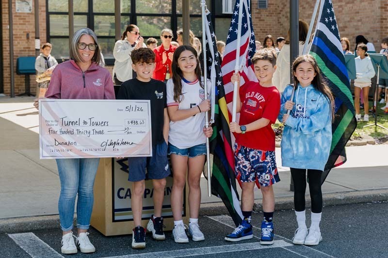 Charles Campagne Elementary School marked the first day of May with an enthusiastic tribute to local first responders