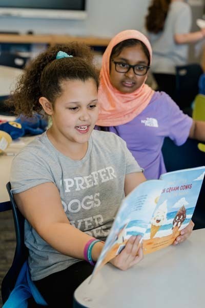 Fifth graders at Central Boulevard School recently hosted an after-school literacy event to foster a love of reading among younger students. 