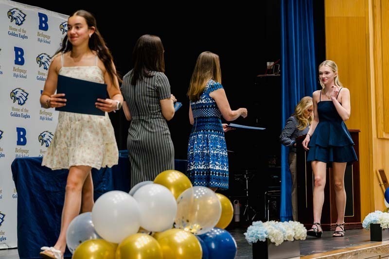 Students walking up to receive awards.