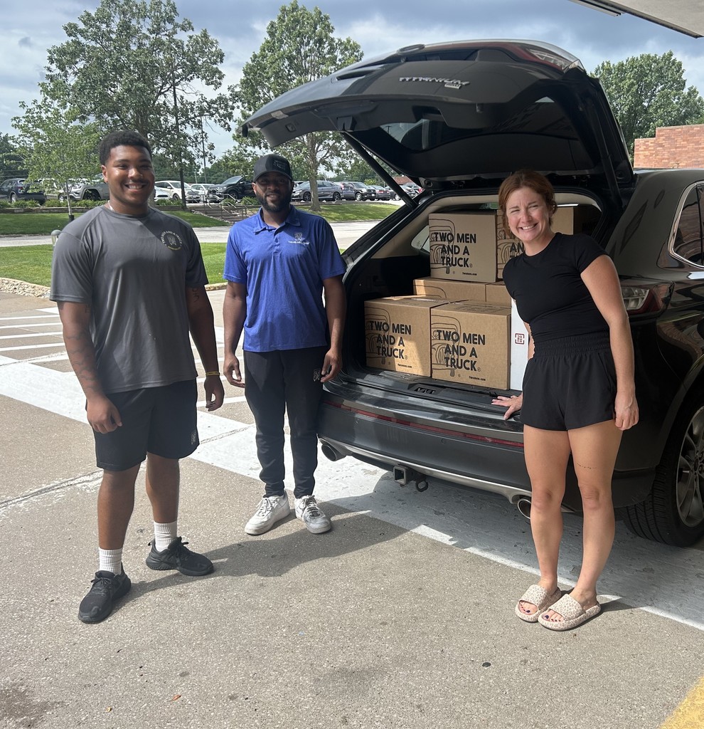Mica Frandsen and helpers loading up school supply donations