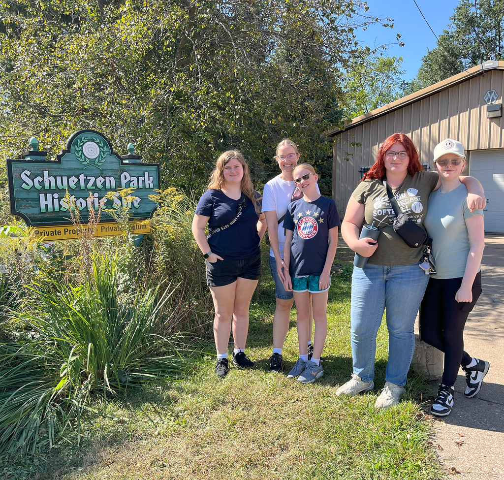 German Club visiting Schuetzen Park Historic Site by park sign