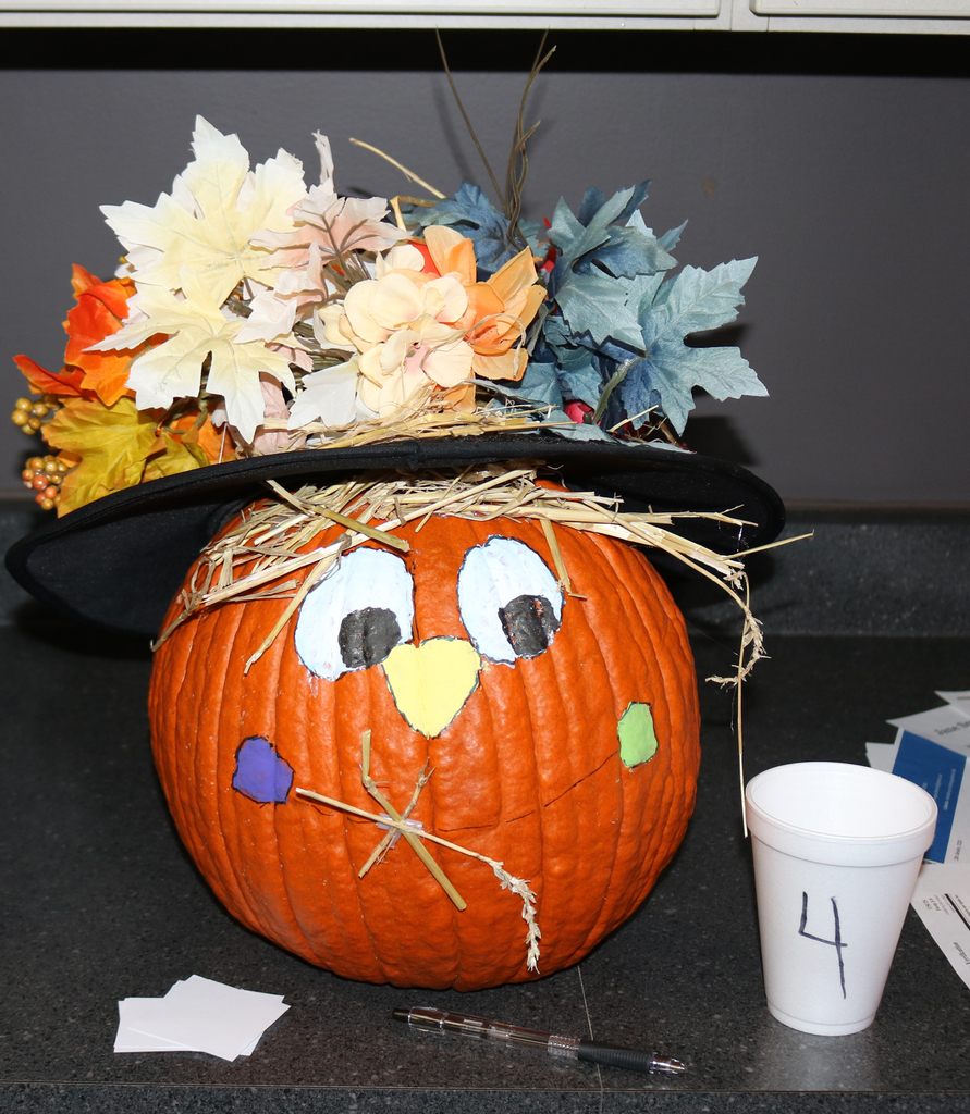 Curriculum Department - Fall foliage hat , straw hair and funny face