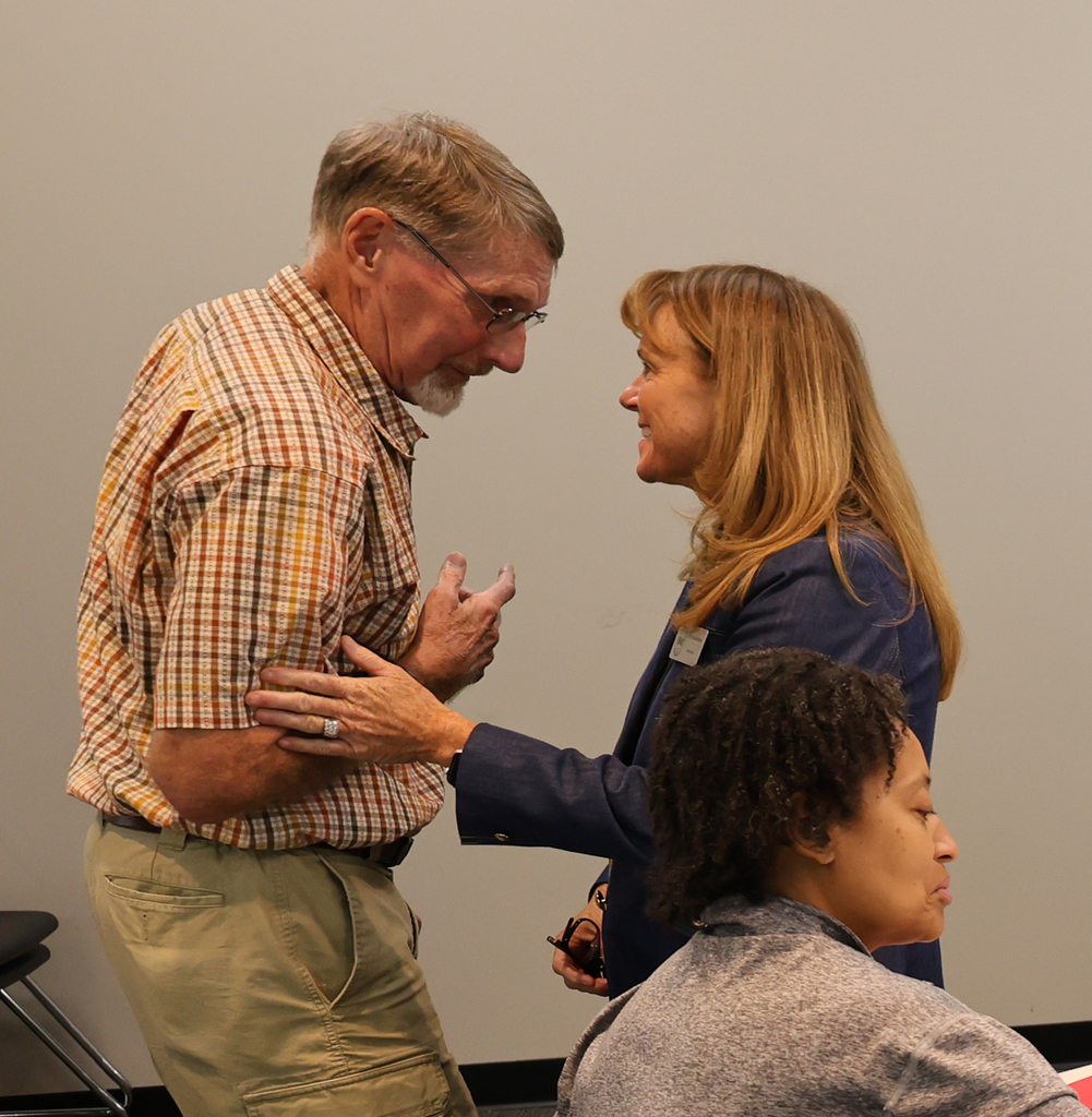 Dr. Morse visiting with one of the SIAC members