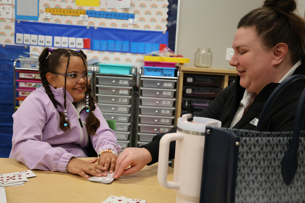 Math Night 2025 - mother and daughter playing a card game