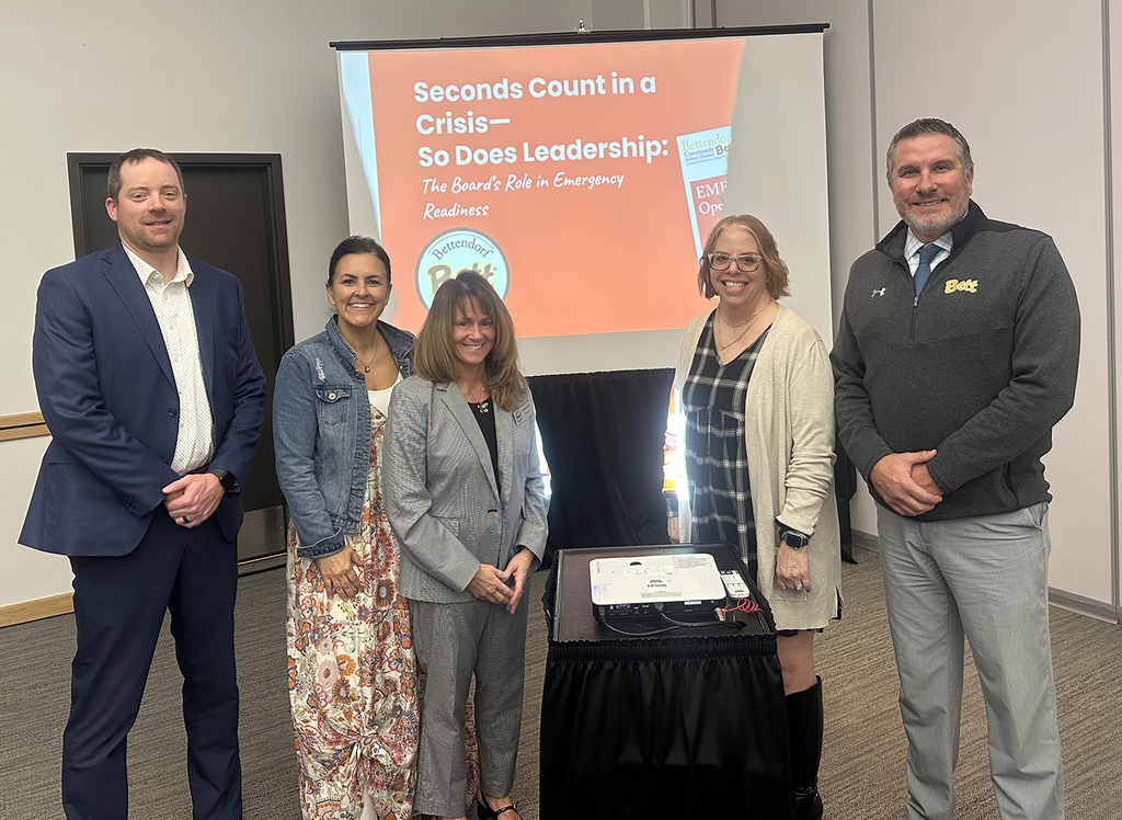 Bettendorf Police Officer Matt Poirier and the distirict leardership team