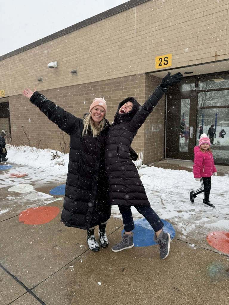 Teachers posing in hte snow
