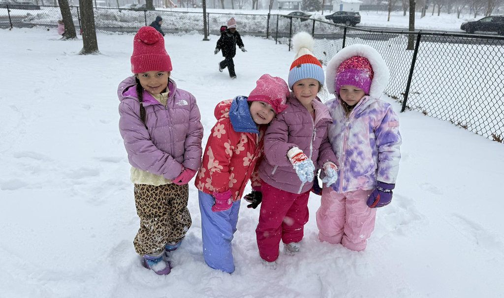 Row of girls posing for a pic