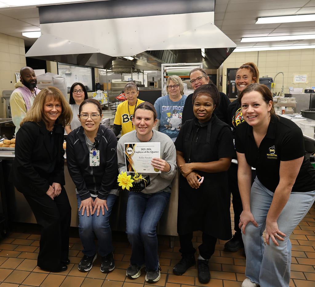 Ashley Sanders with Dr. Morse, Nutrition Services Manager Michelle Riessen, and the BHS kitchen crew.