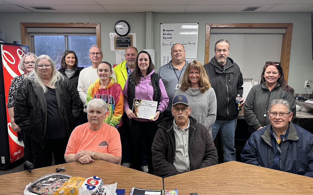 Kim Haut with Dr. Morse with the operations staff and a few former operations employees