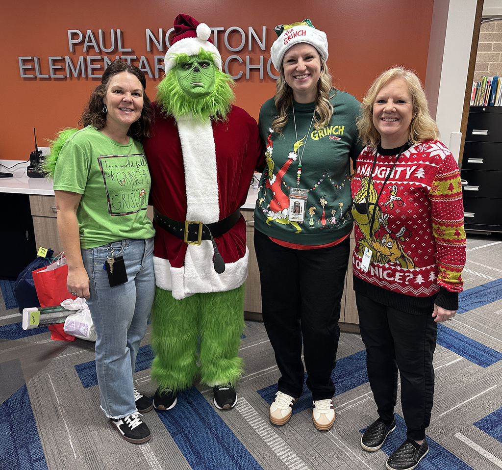 PN staff wearing Grinch inspired outfits