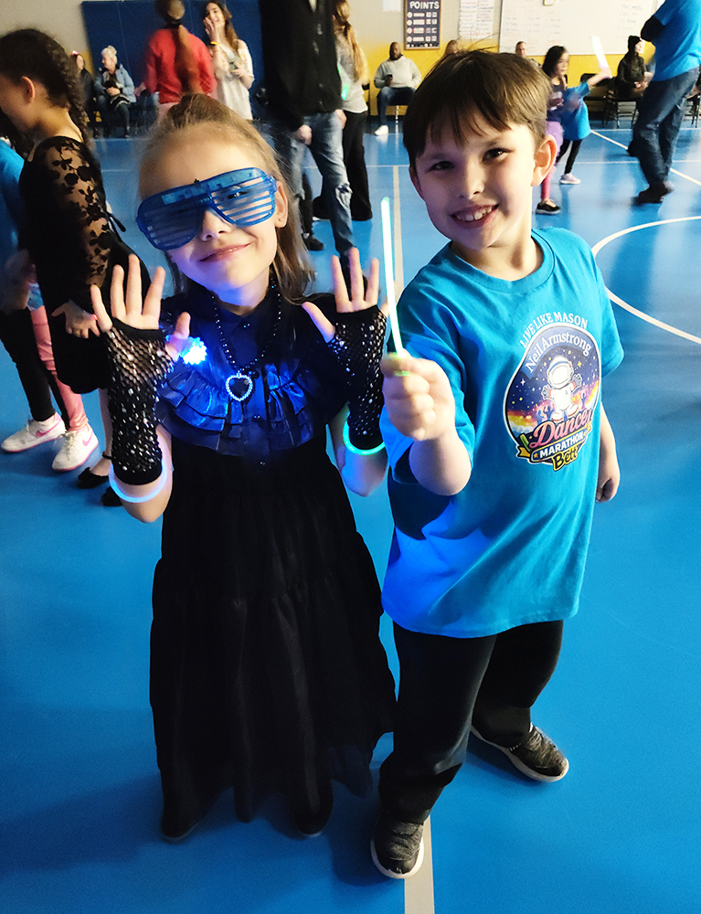 Dance Marathon - Students showing off their costume and lights