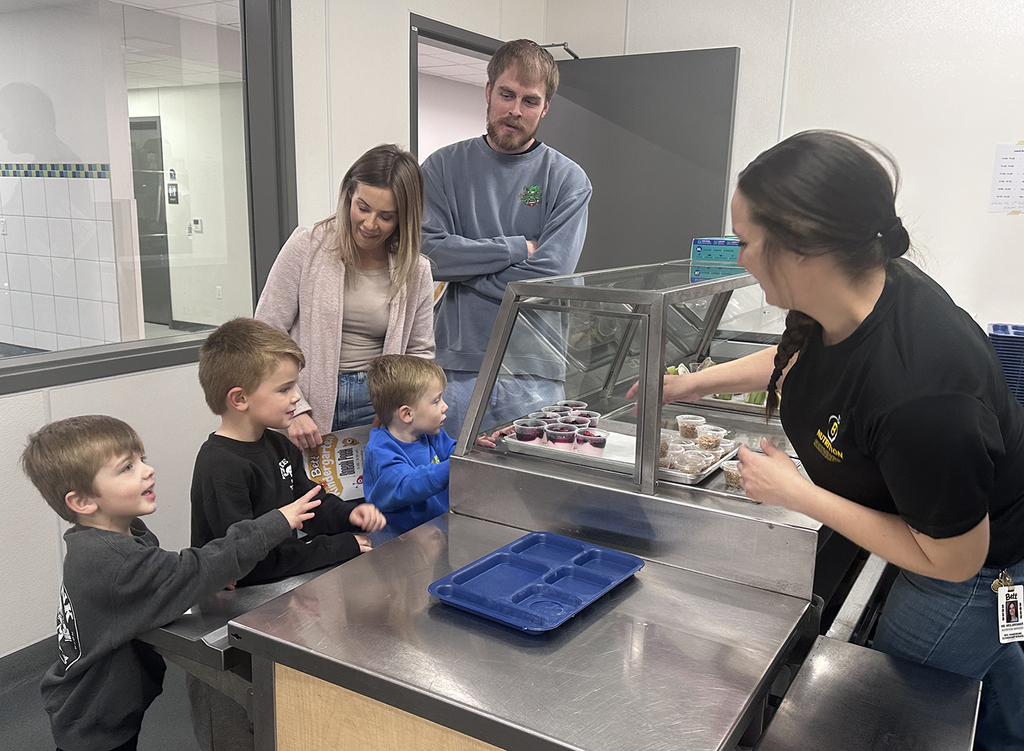 Family going through the snack line