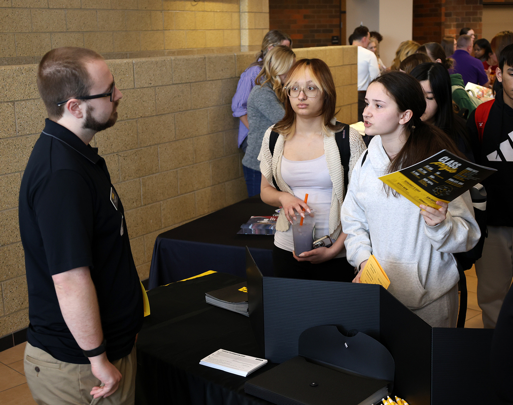 BHS college/university reps vsit with BHS seniors.