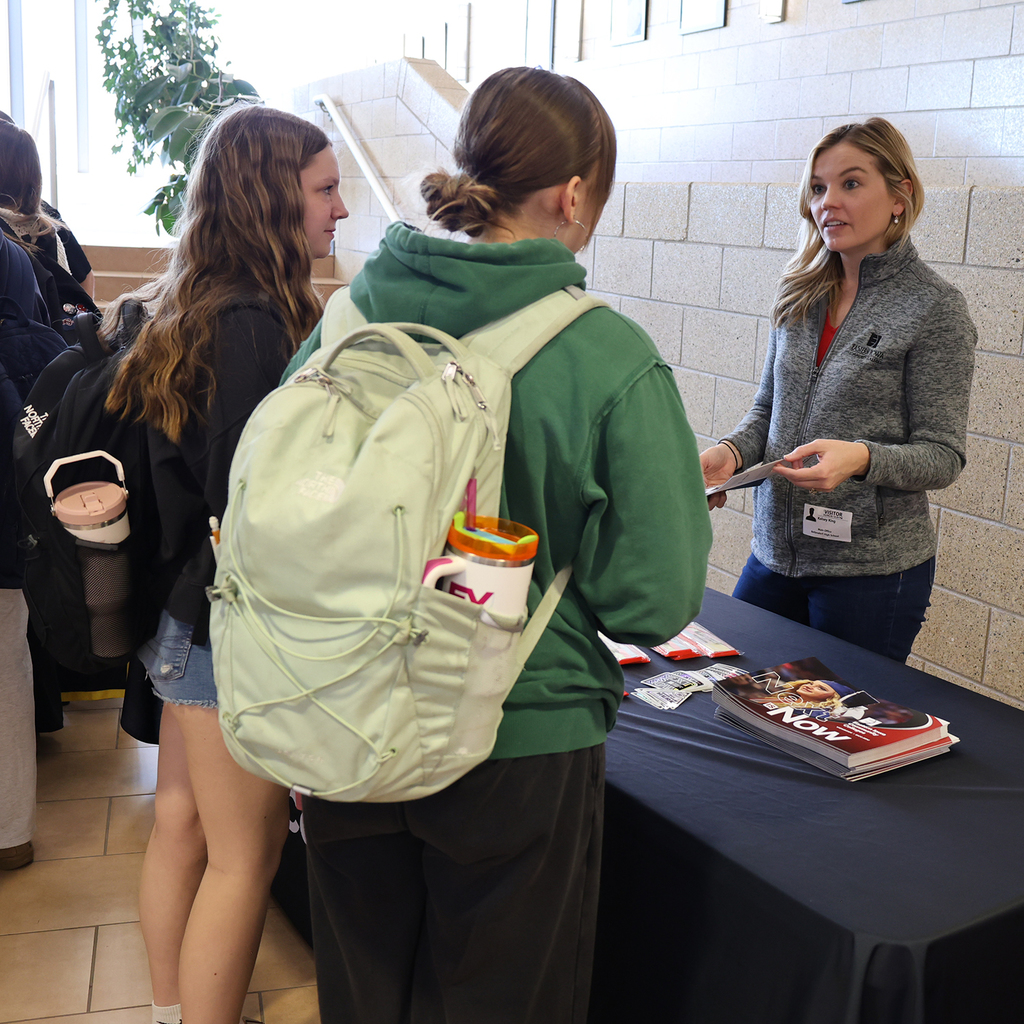 BHS college/university reps vsit with BHS seniors.