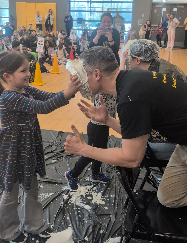 Matt Brenot gets a pie in the face