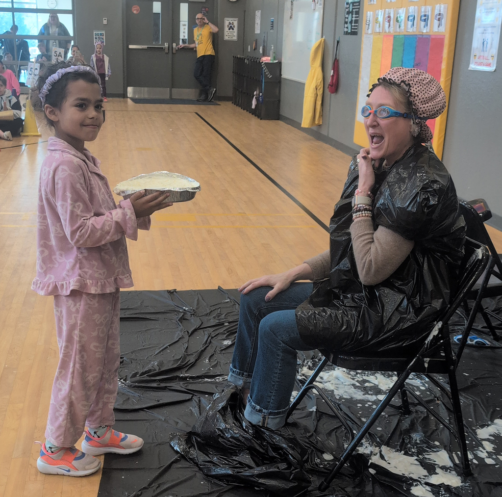 Student about to pie principal Graap