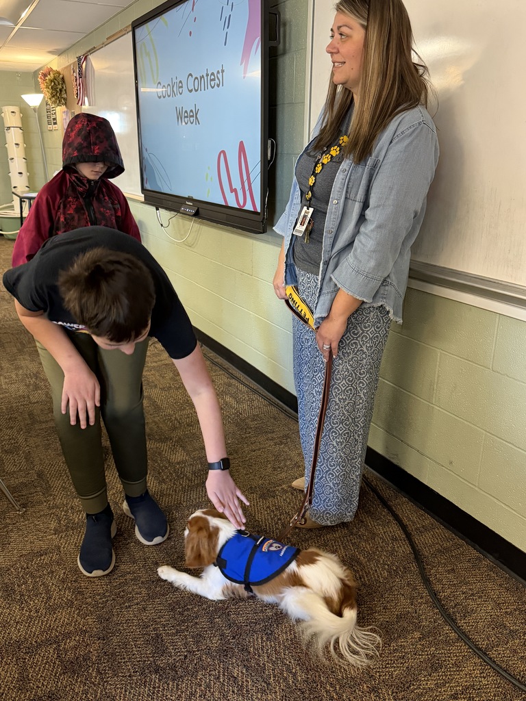 MS student petting Ernie