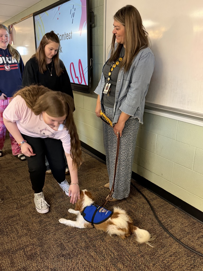 MS student petting Ernie