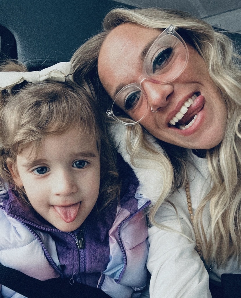 Glenda sharing a moment with a student