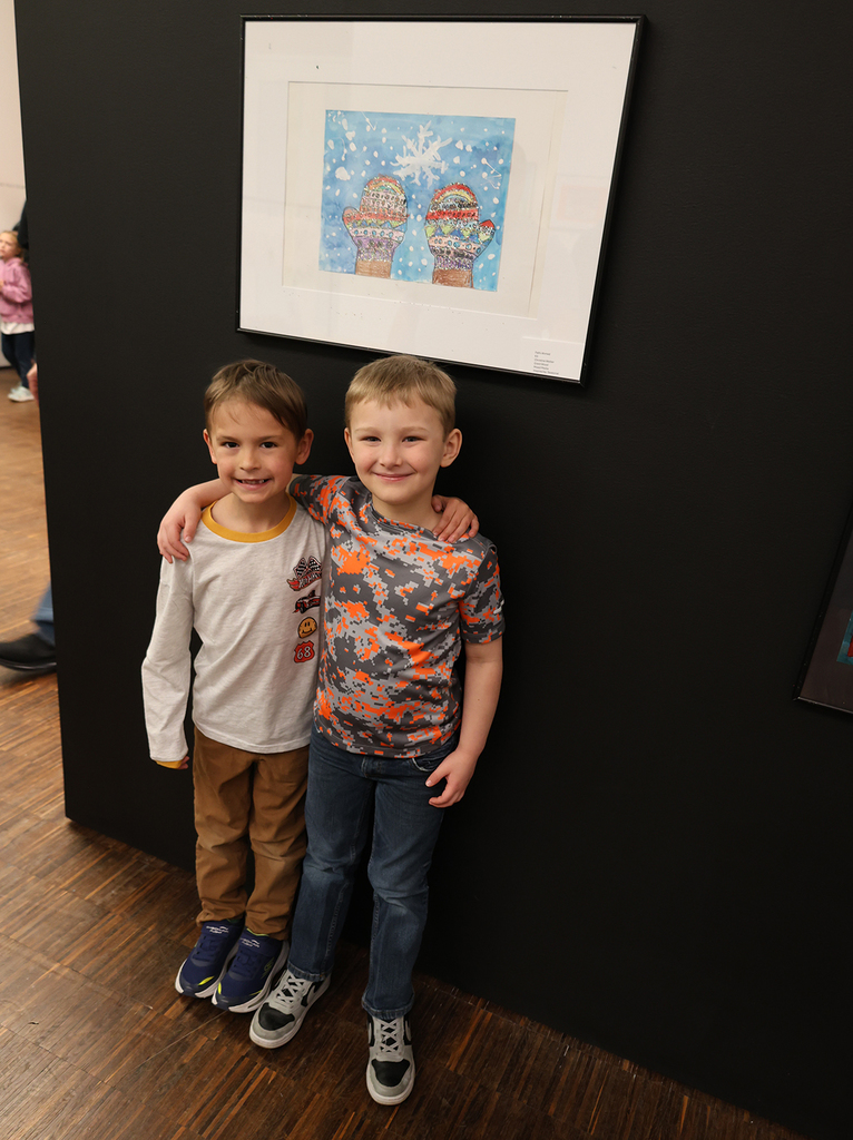 Elementary art showcase at The Figge - two boys in front of an artpiece they like