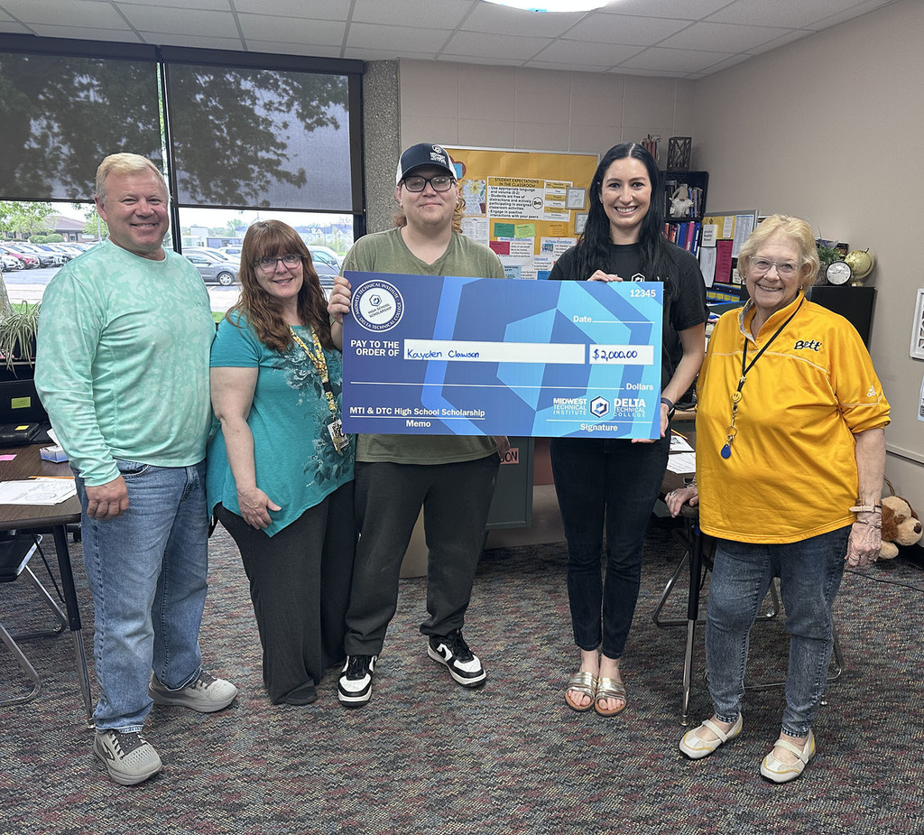 Kayden with his teachers and  Carla Arnold from  Midwest Technical Institute