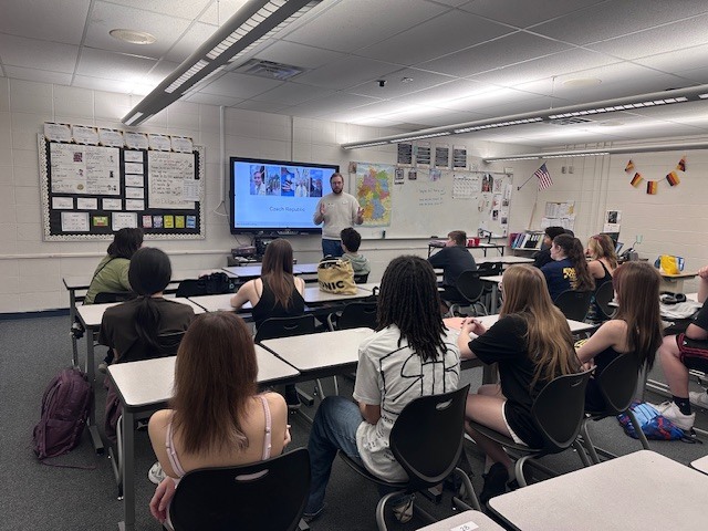 Students listening to Wil Leubke his visit to the Czech Republic