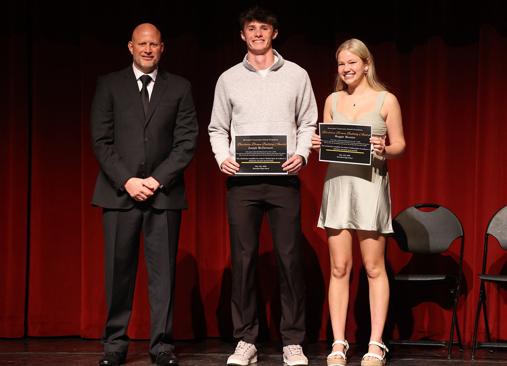 Zach Shay with Joseph McDermott and Maggie Menster, winner of the Barb Brown Bulldog Award