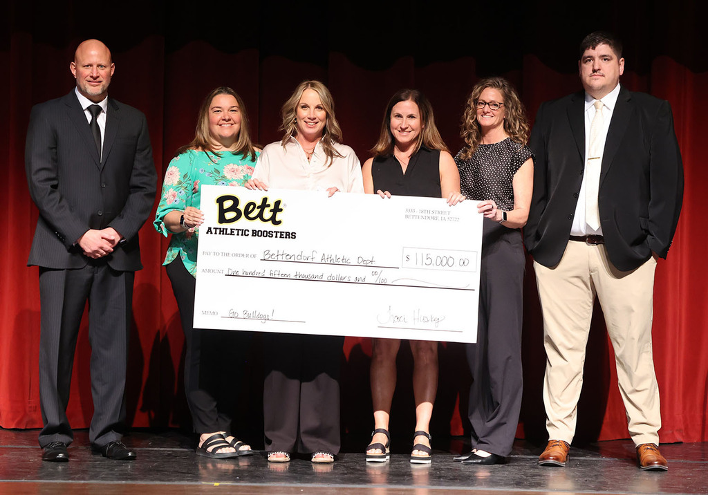 Bulldog Booster present a check  for $115,000 to BHS athletics