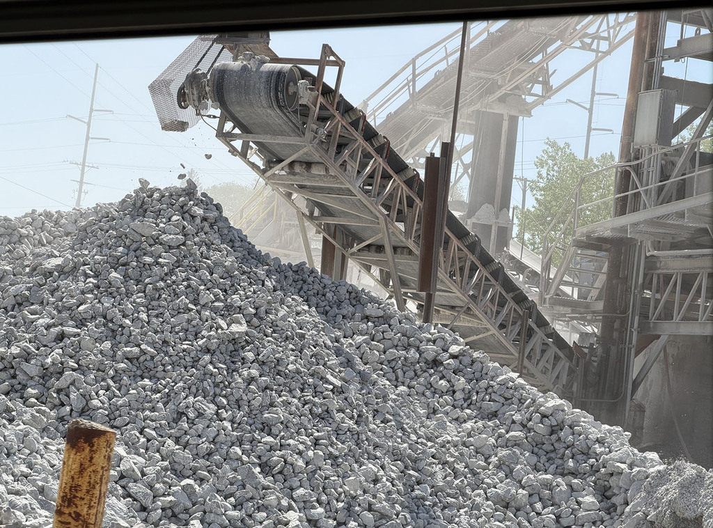 Rock being moved  from the mine with a conveyor belt.